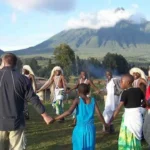 American travelers enjoying gorilla trekking and luxury safari experiences in Rwanda's Volcanoes National Park