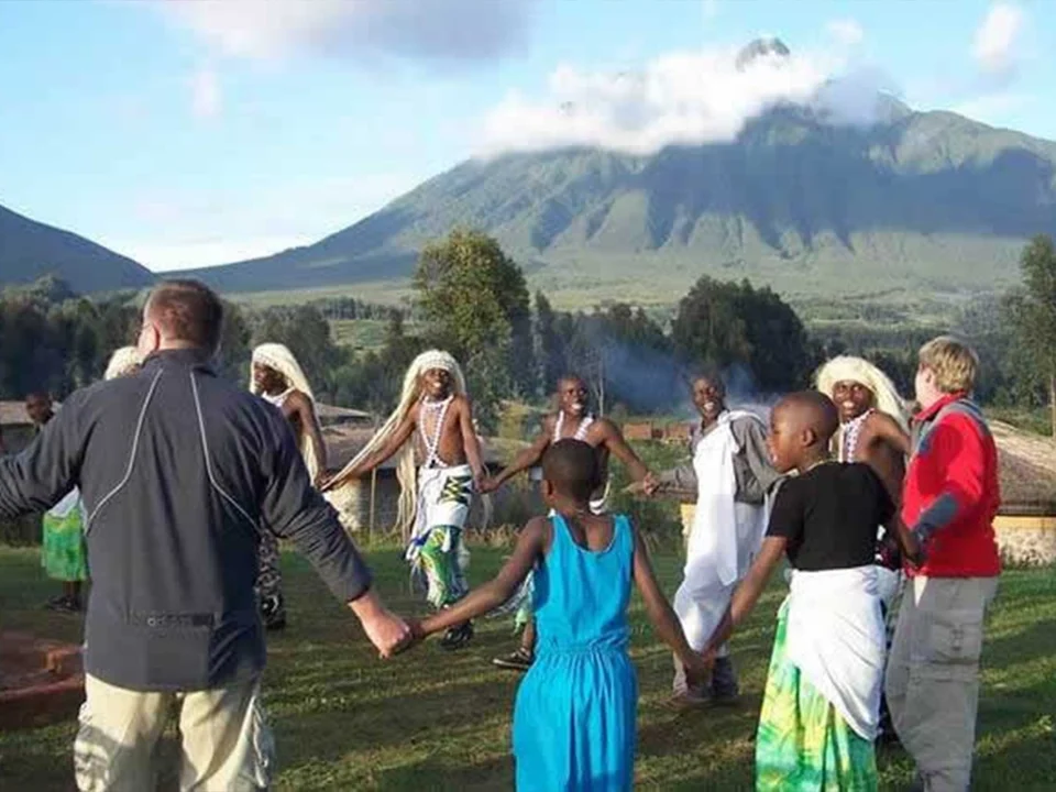 American travelers enjoying gorilla trekking and luxury safari experiences in Rwanda's Volcanoes National Park